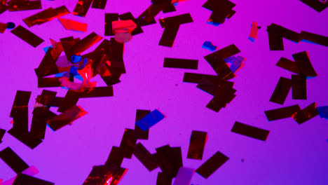 Close-Up-Of-Sparkling-Confetti-On-Floor-Of-Nightclub-Bar-Or-Disco-With-Flashing-Strobe-Lighting-3
